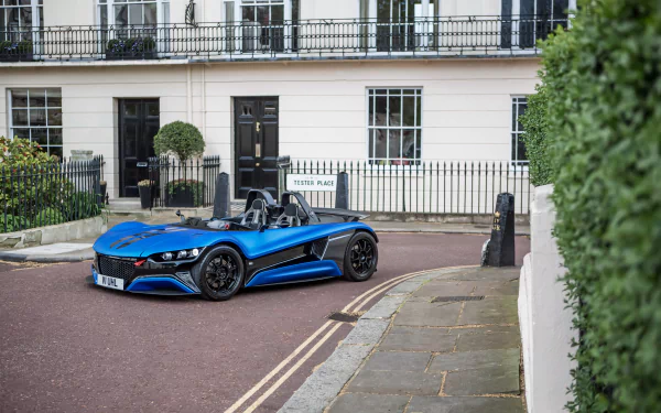 A sleek blue Vauxhall supercar parked on a quiet street, captured in stunning 4K Ultra HD for a PC desktop wallpaper and background.
