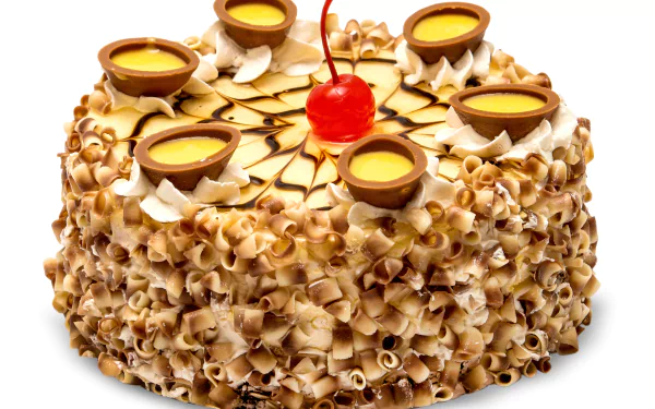 4K Ultra HD desktop wallpaper of a round cake covered in curled chocolate shavings, topped with caramel-filled cups and a single red cherry in the center.