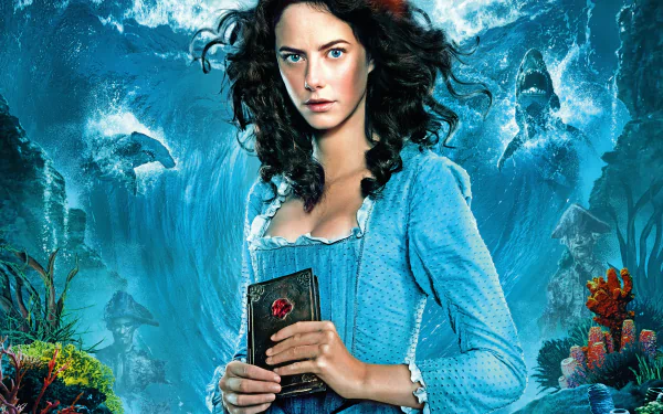 Carina Smyth, portrayed by Kaya Scodelario, stands confidently against a vivid underwater backdrop in this stunning 4K Ultra HD wallpaper from *Pirates of the Caribbean: Dead Men Tell No Tales*.