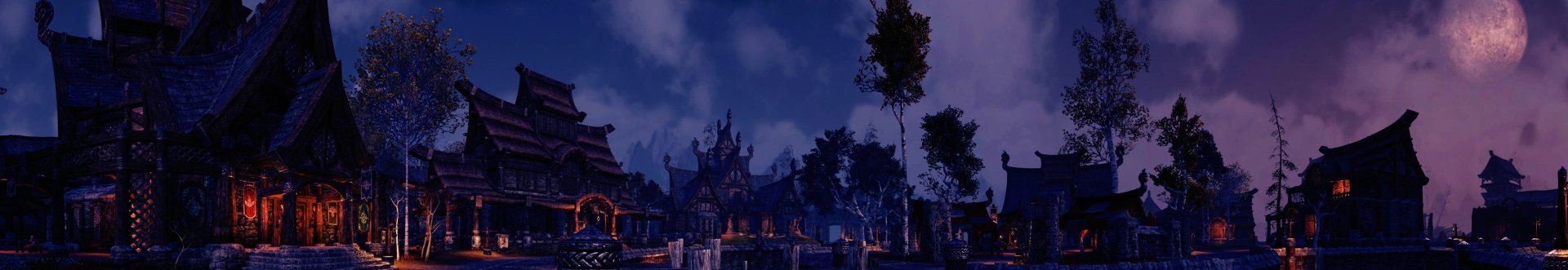 Nighttime Tamriel village from the video game The Elder Scrolls Online, glowing buildings and trees reflected in calm water — HD PC desktop wallpaper and background.