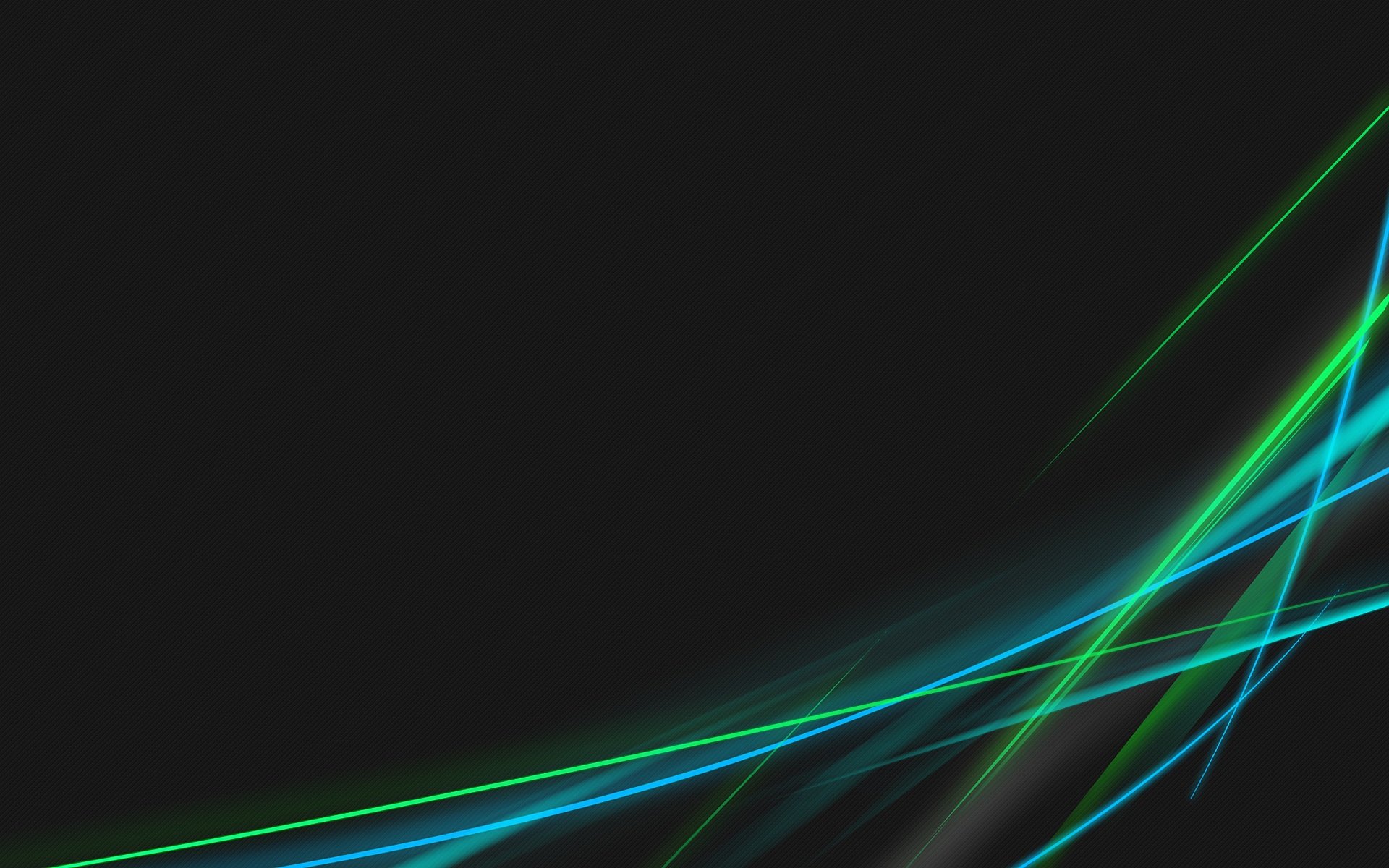 Abstract CGI artwork featuring dynamic fractal patterns with vibrant blue and green colors, illuminated by light, creating a cool, modern desktop wallpaper experience.