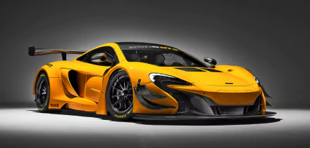Yellow McLaren 650S GT3 race car in a sleek studio setting, showcased as an HD PC desktop wallpaper and background.