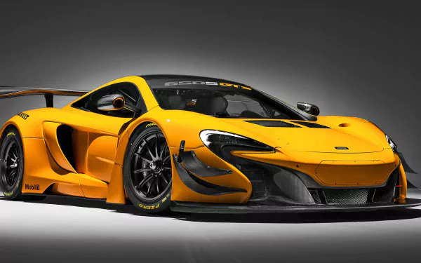 Yellow McLaren 650S GT3 race car in a sleek studio setting, showcased as an HD PC desktop wallpaper and background.