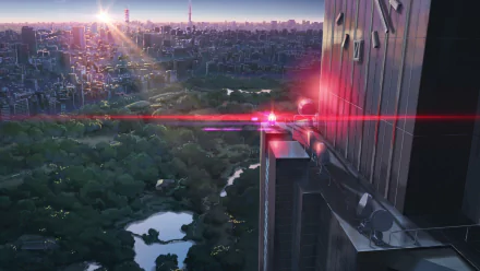 HD anime desktop wallpaper from The Garden Of Words, featuring a sunlit cityscape with a large park below and a building edge sporting a reflective lens flare.