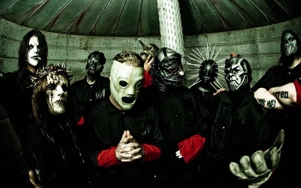 HD desktop wallpaper featuring Slipknot band members in signature masks, capturing the intense vibe of heavy metal, industrial metal, and nu metal music genres.