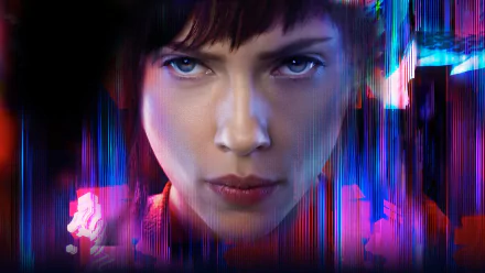 Close-up of Scarlett Johansson as Major in Ghost in the Shell (2017), with vibrant neon glitch effects, featured in an HD PC desktop wallpaper background.
