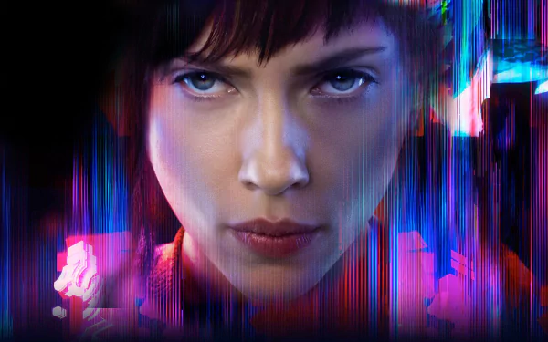Close-up of Scarlett Johansson as Major in Ghost in the Shell (2017), with vibrant neon glitch effects, featured in an HD PC desktop wallpaper background.