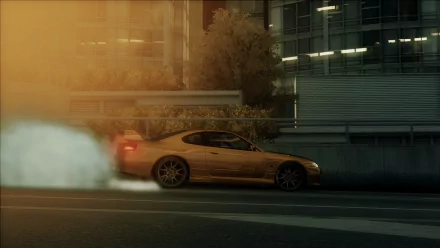 HD PC desktop wallpaper from the video game Need for Speed: Undercover — a gold sports car drifts on an urban street at night, tires smoking against a modern city background.