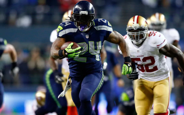 HD desktop wallpaper featuring Seattle Seahawks player Marshawn Lynch in action on the football field.