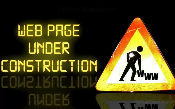 HD desktop wallpaper of a Web Page Under Construction sign with a glowing yellow warning triangle and figure at work.