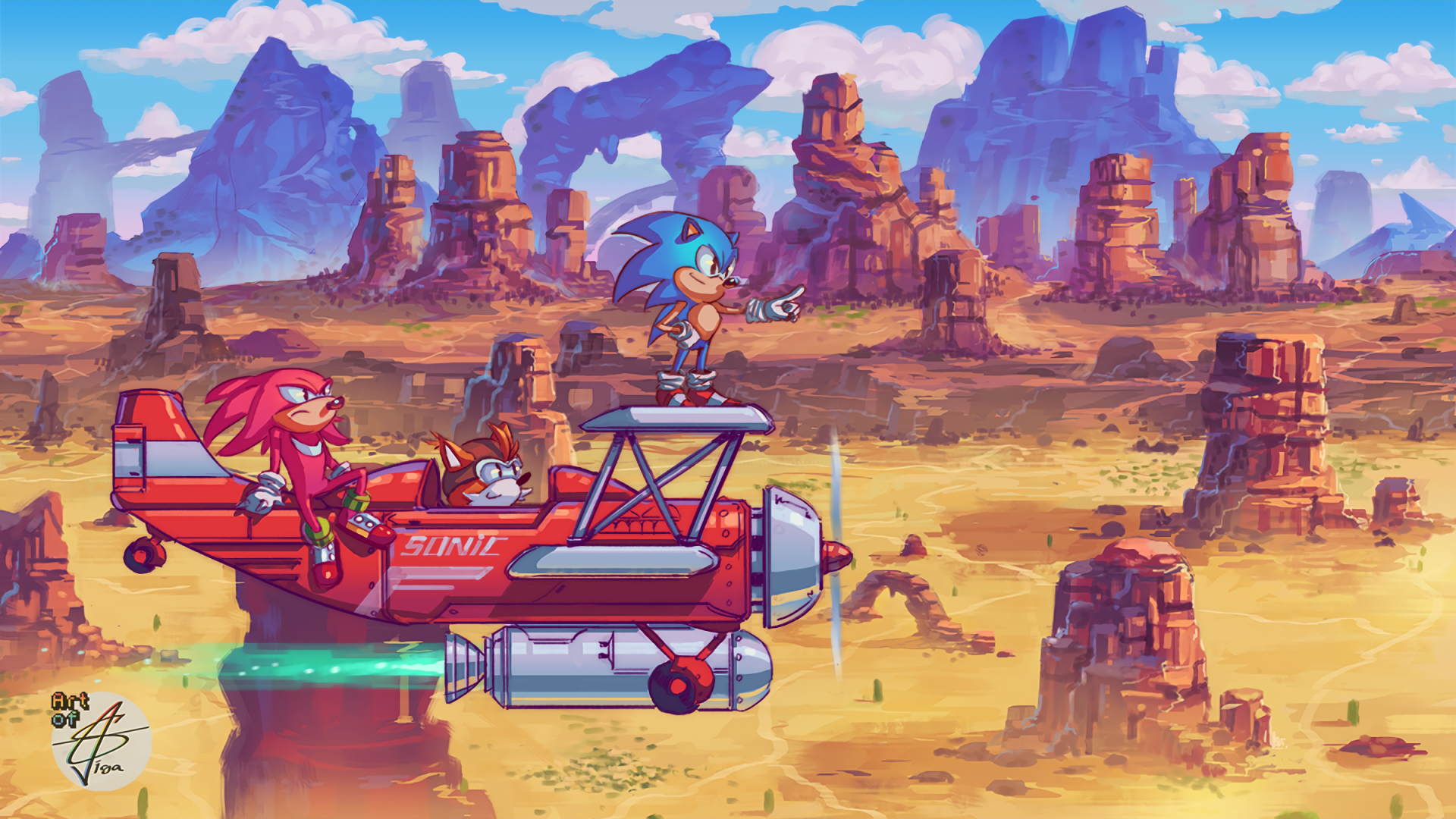 HD wallpaper featuring Sonic the Hedgehog, Miles 'Tails' Prower, and Knuckles the Echidna from Sonic Mania. They are flying over a desert landscape with rock formations and a bright blue sky.