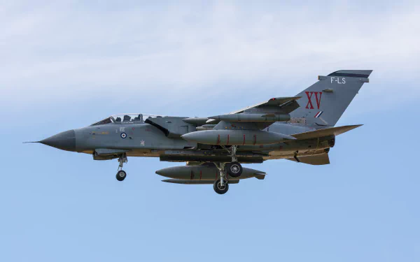 A Panavia Tornado jet fighter warplane in flight against a clear sky, captured in 4K Ultra HD quality as a military aircraft desktop wallpaper.