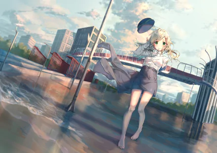 Anime-style HD desktop wallpaper of a blonde girl with green eyes in a uniform and hat, standing barefoot by water near a bridge in an urban setting.