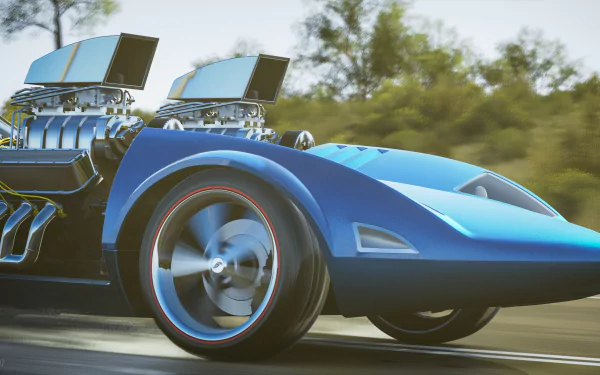 Close-up of a blue Hot Wheels–style racing car with exposed twin superchargers and a spinning front wheel, motion-blurred road and trees — 4K Ultra HD PC desktop wallpaper referencing Forza Motorsport and Forza Horizon 3.