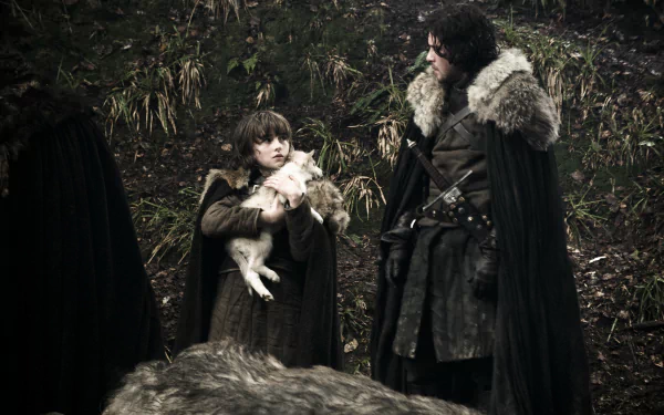 Game of Thrones 4K desktop wallpaper: Jon Snow and young Bran Stark in fur cloaks in a forest clearing, Bran cradling a direwolf pup.