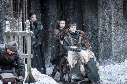 4K Ultra HD wallpaper featuring Bran Stark (Isaac Hempstead-Wright), Arya Stark (Maisie Williams), and Sansa Stark (Sophie Turner) from the TV show Game of Thrones in a snowy scene.