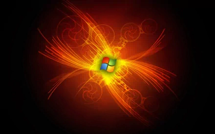 A dynamic HD wallpaper featuring the Windows logo surrounded by vibrant flames and fiery effects, representing technology and the essence of Windows 7.