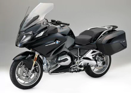 Black BMW R1200RT touring motorcycle on a neutral background, 2K Quad HD PC desktop wallpaper and vehicle image.