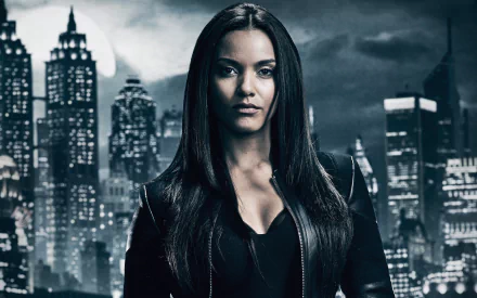 Jessica Lucas as a character from Gotham TV show, set against a dark cityscape, featured in an HD PC desktop wallpaper.