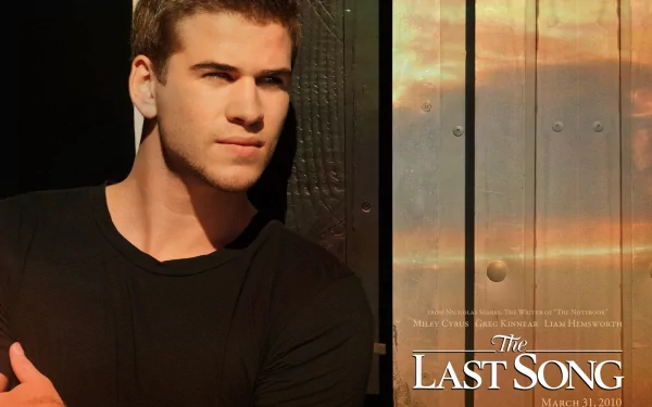 HD desktop wallpaper featuring a close-up of Hemsworth from the 2010 movie The Last Song, with a sunset background and the film's title logo.