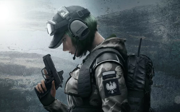HD desktop wallpaper featuring Ela from the video game Tom Clancy's Rainbow Six: Siege, portraying her in tactical gear holding a pistol against a rugged background.