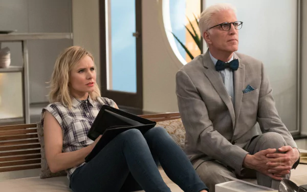 HD desktop wallpaper featuring two characters from The Good Place sitting and looking thoughtful.