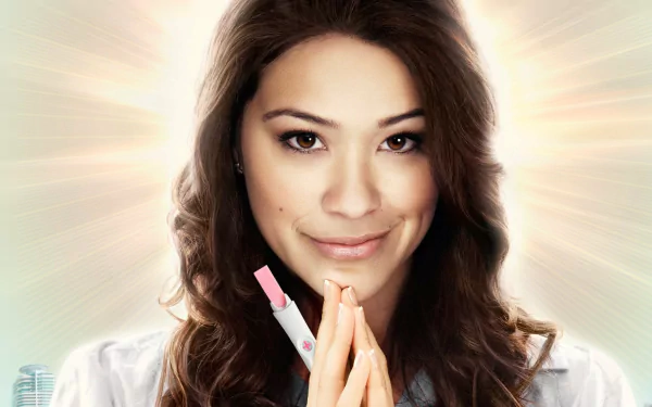HD desktop wallpaper from Jane the Virgin featuring a smiling woman with a glowing background.