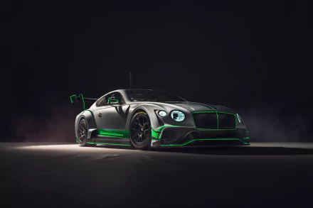 A sleek Bentley Continental GT3 race car with green accents, showcased in a dramatic 4K Ultra HD desktop wallpaper against a dark, smoky background.