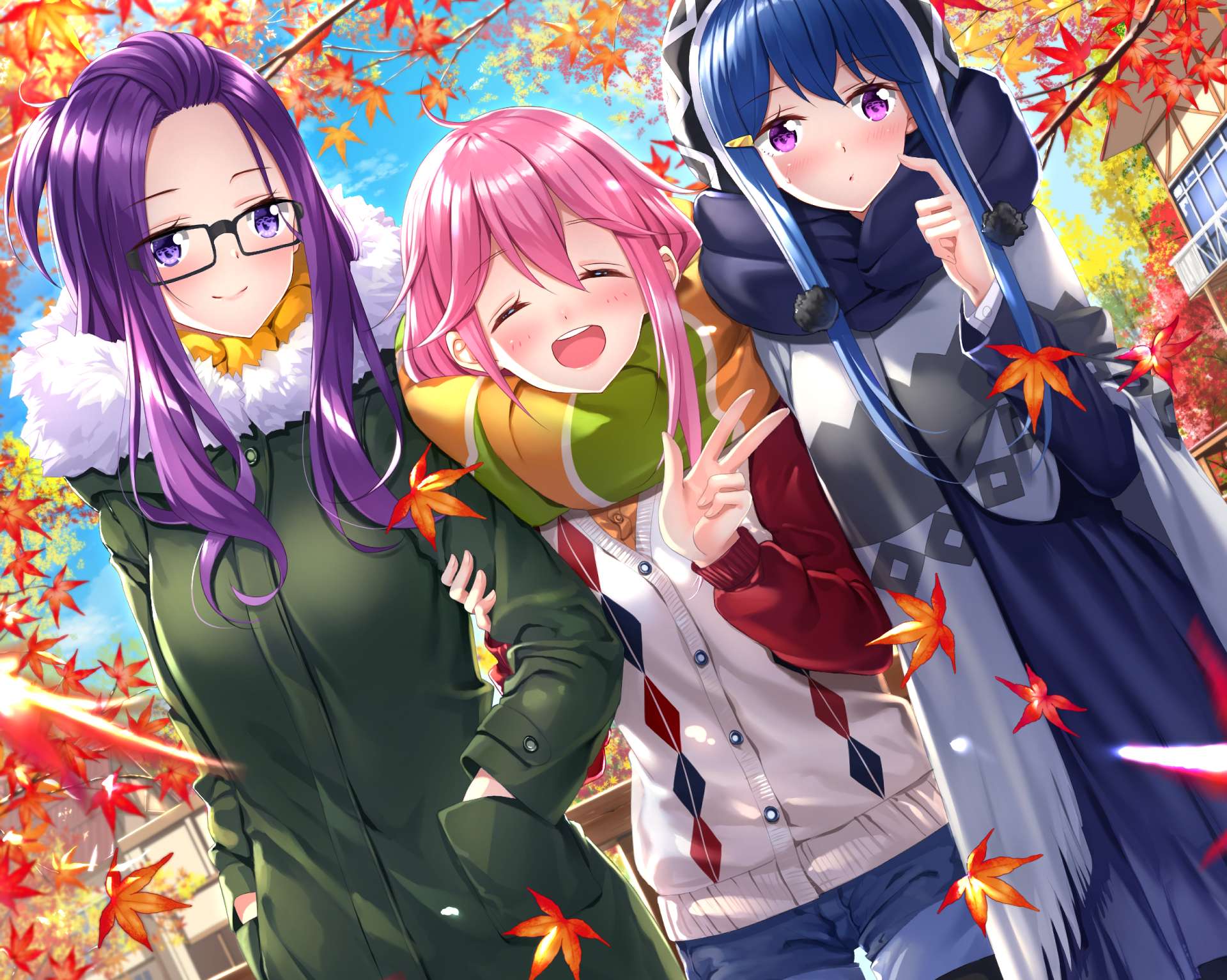 HD anime desktop wallpaper featuring Chiaki Oogaki, Rin Shima, and Nadeshiko Kagamihara from Laid-Back Camp enjoying autumn outdoors with falling maple leaves.