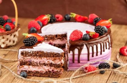 HD desktop wallpaper featuring a still life of a layered cake topped with blueberries, strawberries, raspberries, and blackberries, highlighting vibrant berries and rich pastry.