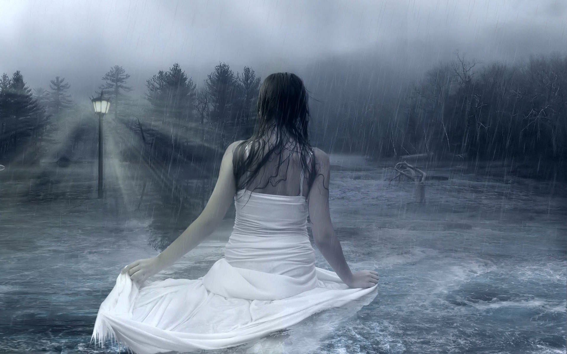 Dark, emo HD PC desktop wallpaper depicting a solitary figure in a white dress sitting in a rain-soaked, misty landscape illuminated by a single streetlamp.