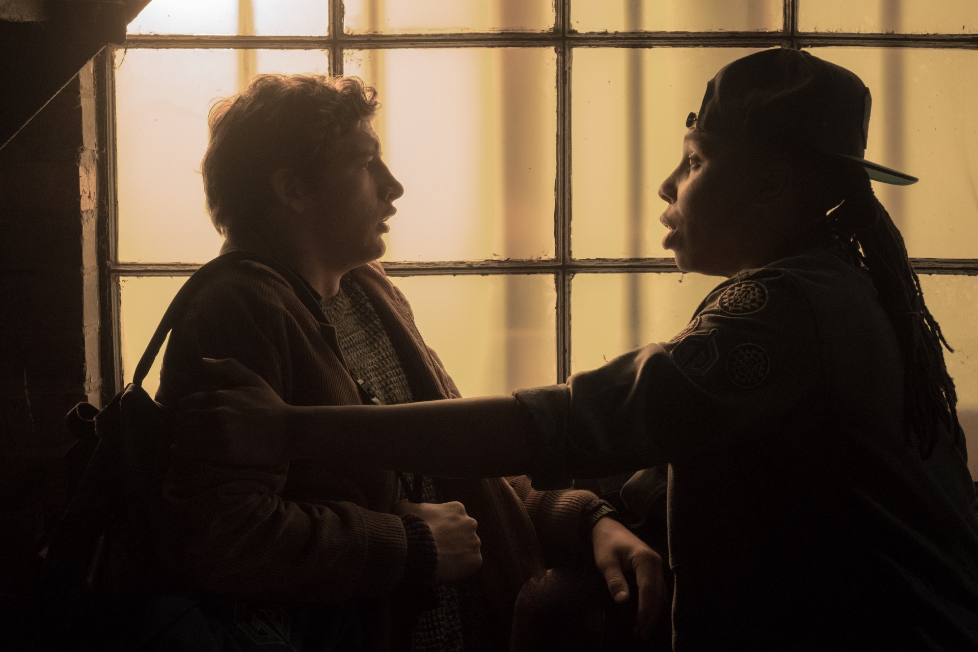 A 4K Ultra HD desktop wallpaper featuring Lena Waithe and Tye Sheridan in a dramatic scene from the movie Ready Player One.