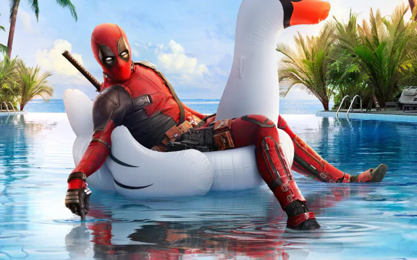 HD desktop wallpaper from the movie Deadpool 2 showing Deadpool relaxing on a white swan pool float in a tropical setting with palm trees in the background.