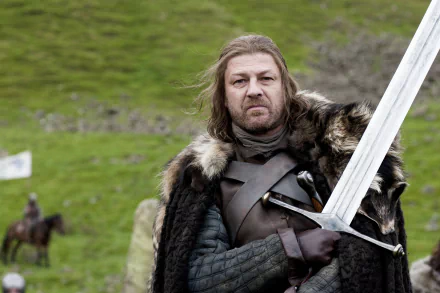 HD desktop wallpaper featuring Sean Bean as Eddard Stark from the TV show Game of Thrones, holding a sword with a grassy background.