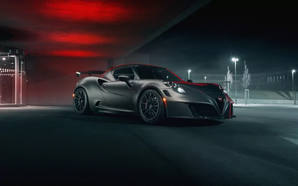 Silver Alfa Romeo 4C supercar parked under red and white lights in a moody urban garage — 4K Ultra HD PC desktop wallpaper of the sleek performance vehicle.