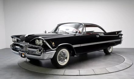 HD desktop wallpaper showcasing a sleek black Dodge Royal Lancer classic vehicle against a neutral background.