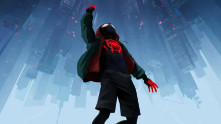 HD desktop wallpaper showing Miles Morales as Spider-Man from the movie Spider-Man: Into The Spider-Verse raising one arm, with a futuristic cityscape in the background.