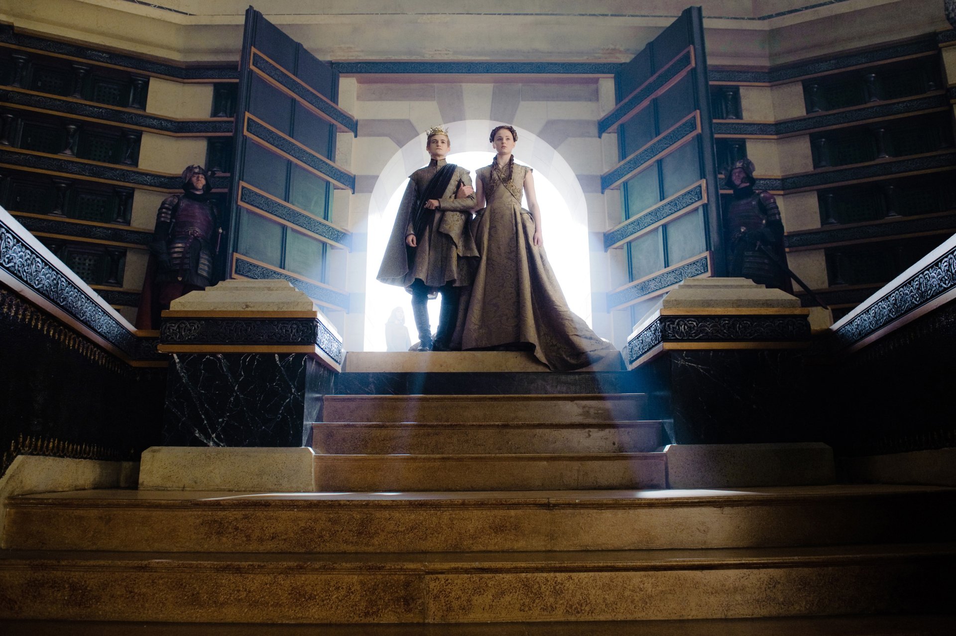 Sansa Stark and Joffrey Baratheon stand on sunlit steps in a grand throne room — Game of Thrones 4K Ultra HD PC desktop wallpaper.