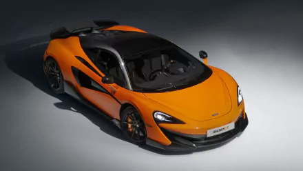 Orange McLaren 600LT supercar showcased in 4K Ultra HD as a striking PC desktop wallpaper and background.