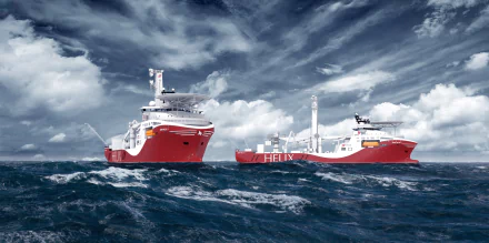 Two red Offshore Support Vessels, Siem Helix 1 and Siem Helix 2, navigate the sea under a dramatic cloudy sky in this HD desktop wallpaper.