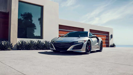 Silver Acura NSX supercar parked in front of a modern house, captured in 4K Ultra HD as a sleek PC desktop wallpaper and background.