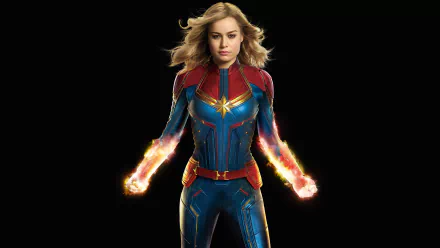 HD desktop wallpaper featuring Brie Larson as Captain Marvel, showcasing her in costume with glowing fists against a black background.