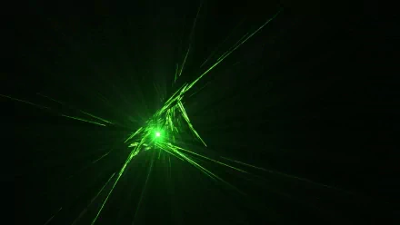 HD desktop wallpaper featuring an abstract design of broken glass illuminated by green light against a dark background.