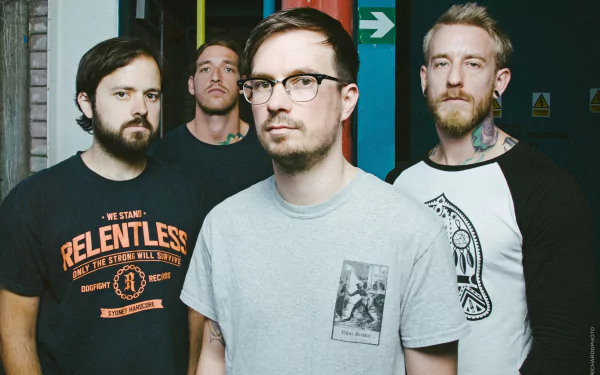 HD desktop wallpaper featuring the band Funeral for a Friend in a poised group portrait.