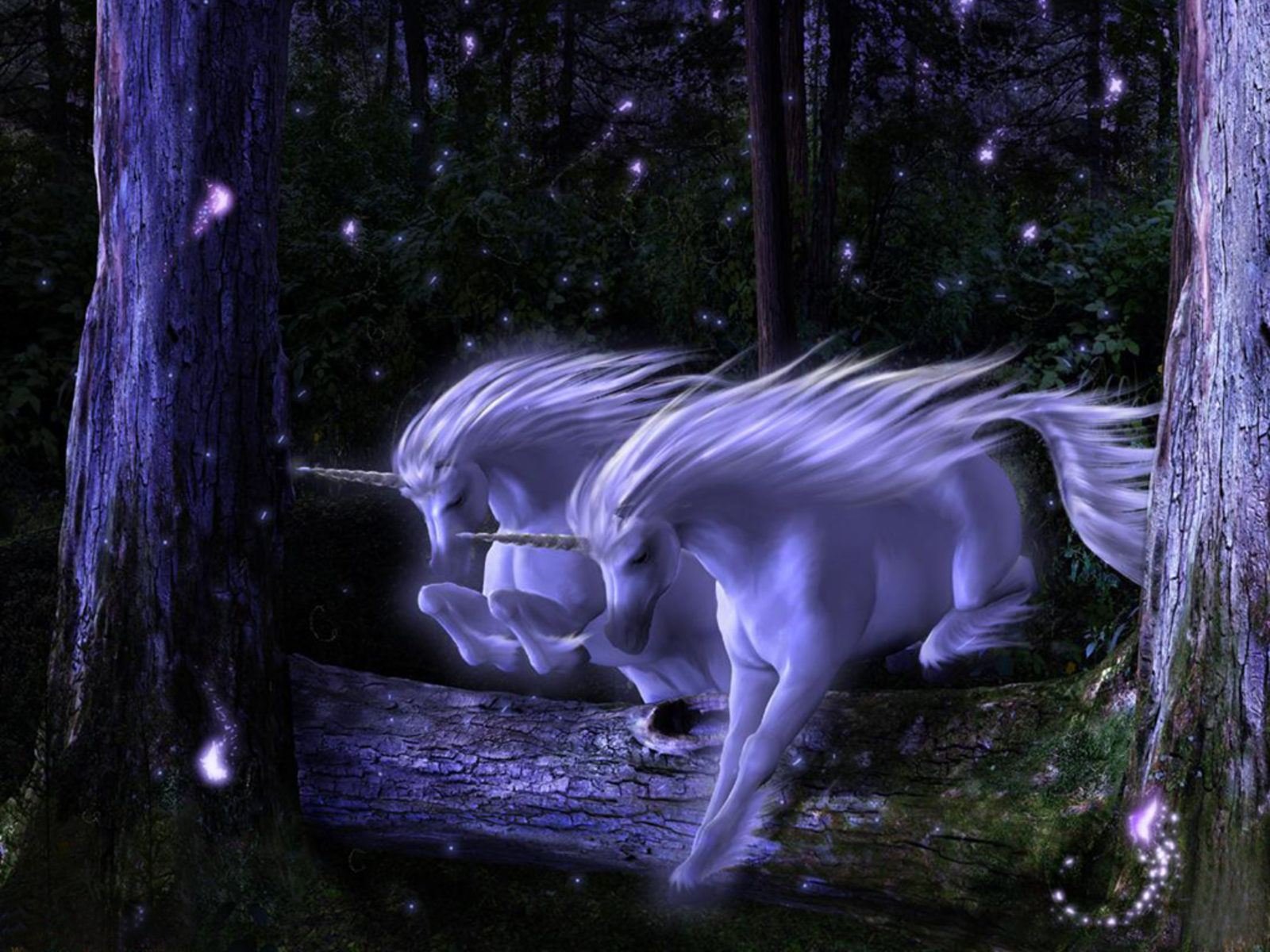 Purple Unicorns - a vivid desktop wallpaper with majestic mythical creatures.