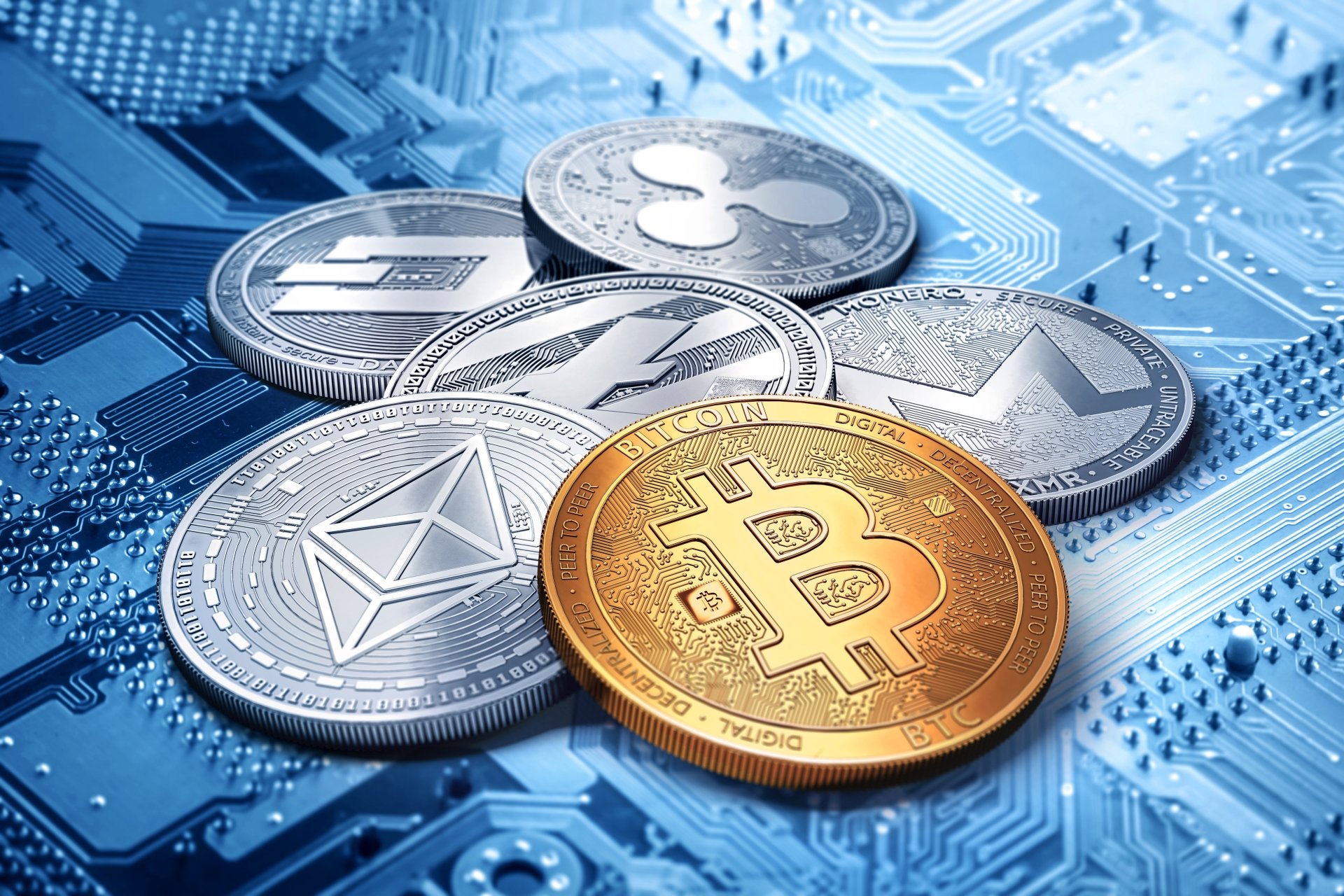 4K Ultra HD PC wallpaper: cryptocurrency coins (Bitcoin, Ethereum, XRP, Litecoin, Monero) resting on a blue circuit board, representing digital money, coin technology and blockchain finance.