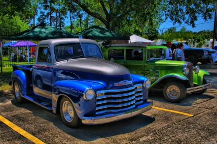 A vibrant HDR image featuring classic Chevrolet vehicles, showcasing a blue pickup truck and a green vintage car, set against a bright outdoor backdrop.