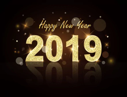 Glittery gold Happy New Year 2019 text on a dark background with sparkling effects. HD desktop wallpaper and background conveying holiday and New Year cheer.