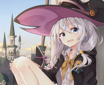HD PC desktop wallpaper featuring Elaina from the anime Wandering Witch: The Journey of Elaina, showcasing her in a detailed witch outfit with a castle backdrop.