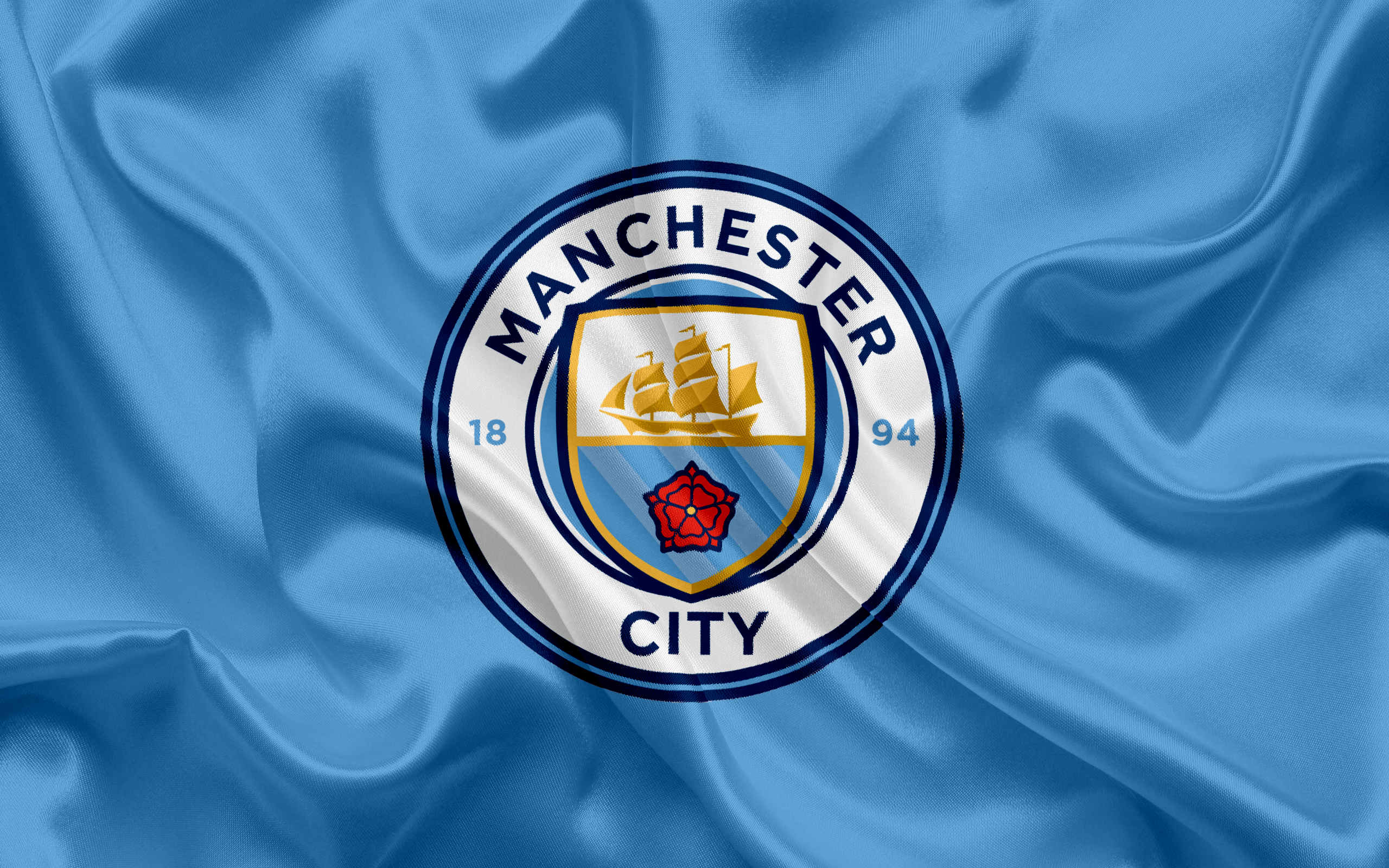 Manchester city football club badge hi-res stock photography and